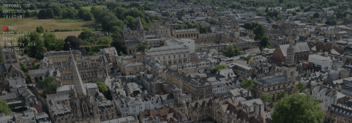 The University of Oxford from above and looking beyond over the city